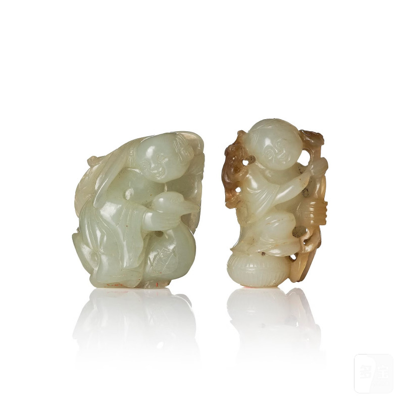 Two well sculptured pale celadon and russet jade sculptures of boys, - 图1